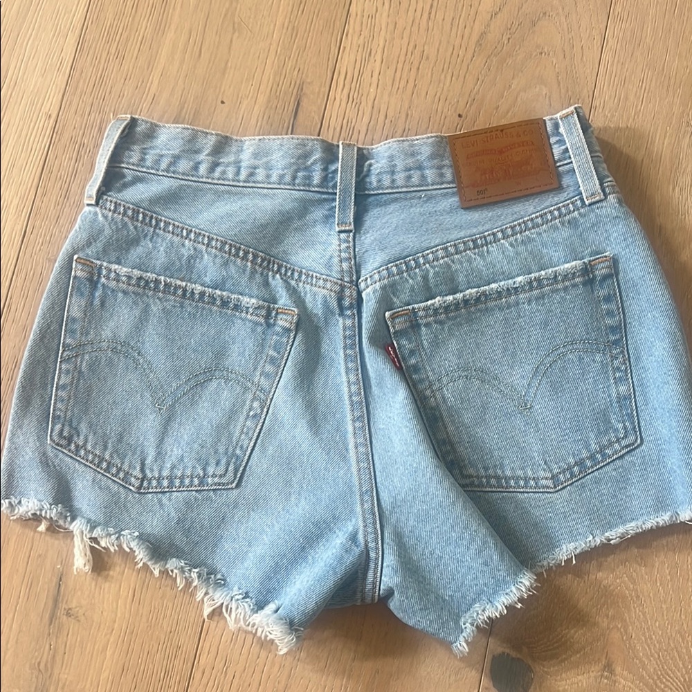 Levi's Blue Jean Shorts with Distressed Hem new without tags